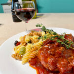 Poulet sauce au vin et tomates